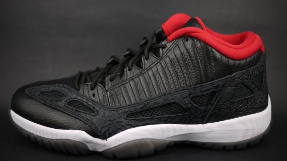 jordan-xi-low-ie-00 Air Jordan XI IE Low: Black Cement / Red