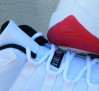air-jordan-xi-retro-low-white-black-varsity-red-new-photos-00