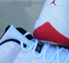 air-jordan-xi-retro-low-white-black-varsity-red-new-photos-01