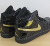 the-daily-jordan-air-jordan-1-black-metallic-gold-2003-02