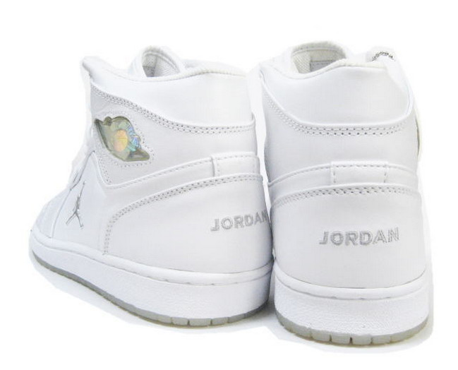 white and silver jordans