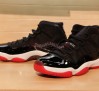 air-jordan-xi-retro-black-red-december-2012-1