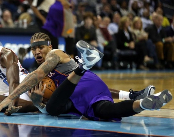 Phoenix Suns v Charlotte Bobcats NBA Jordans on Court: Michael Beasley in Air Jordan VII Flint